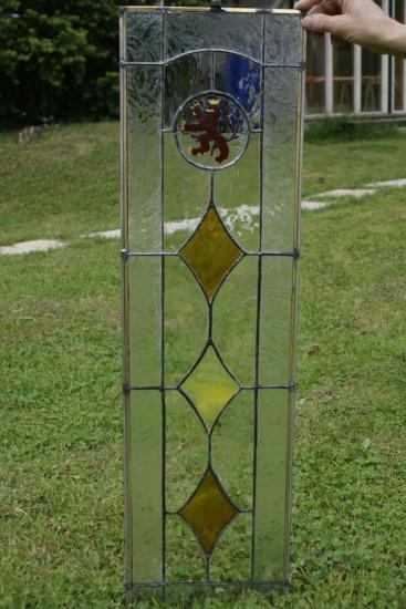 losange et blason lion